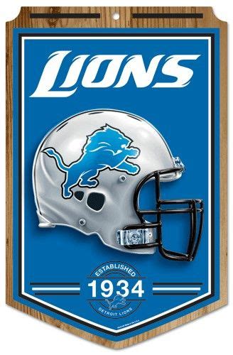 A Detroit Lions Wooden Sign With A Helmet On It