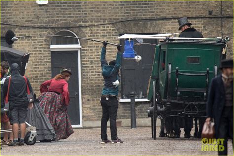 Felicity Jones Films The Aeronauts In The Pouring Rain In London