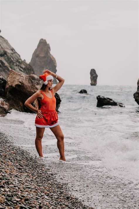 Woman Summer Travel Sea Happy Tourist In Red Bikini And Santas Hat