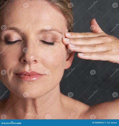 Ageless Beauty At Peace Studio Shot Of A Mature Woman With Beautiful Skin Stock Photo Image
