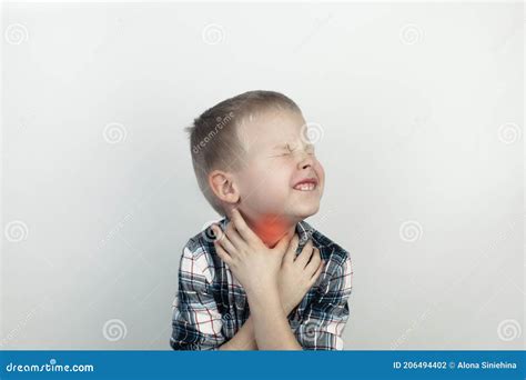 A Pediatrician Examines A Boy Who Complains Of A Sore Throat Diagnosis