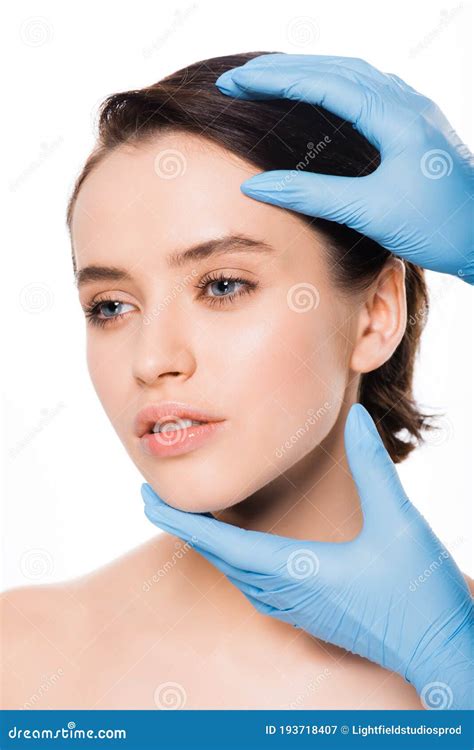 View Of Plastic Surgeon In Blue Latex Gloves Touching Face Of Pretty