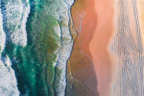 Free Photo Aerial View Of The Beautiful Beach With Crystal Clear Water