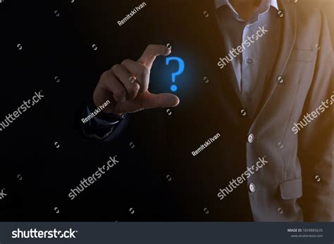 Businessman Man Hand Hold Interface Question Stock Photo