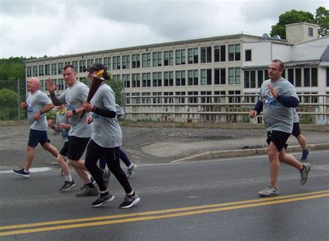 County Law Enforcement Carries The Special Olympics Torch Piscataquis