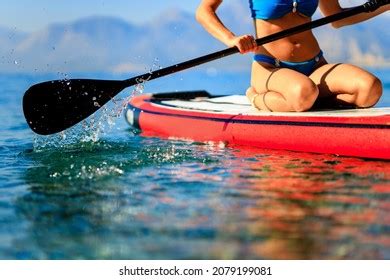 Woman Sitting On Paddleboard Ocean Bikini Images Stock Photos Vectors Shutterstock
