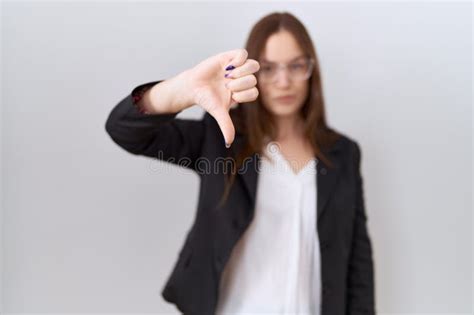 Beautiful Brunette Woman Wearing Business Jacket And Glasses Looking Unhappy And Angry Showing