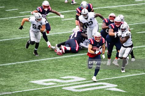 Rex Burkhead Of The New England Patriots Runs The Ball In The First