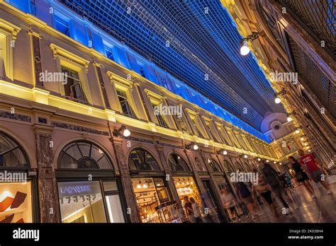 Galleries de la Reine, illuminated in the colors of the Ukrainian flag ...