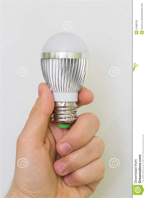 Close Up Led Bulb At The Man Hand Vertical Stock Photo Image Of