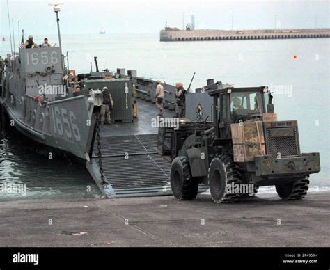 Us Navy Us Army Personnel Assigned To The 567th Transportation Company Offload Water And