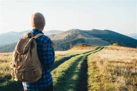 Man With Backpack On Mountains Road Stock Image Image Of Hiking