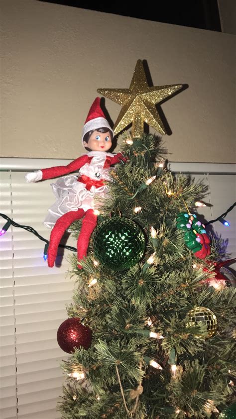 Ellie The Elf On The Shelf Hanging Out On The Christmas Tree Holiday