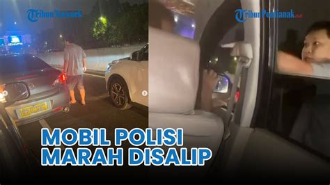 Kronologi Pengemudi Mobil Plat Dinas Polri Pukul Driver Taksi Online