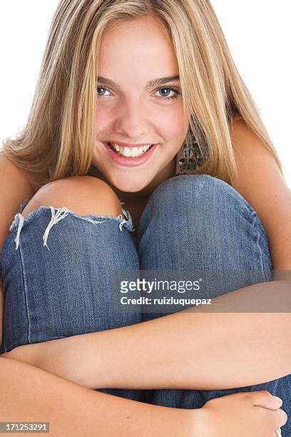 Girl Sitting On Her Knees Photos And Premium High Res Pictures Getty