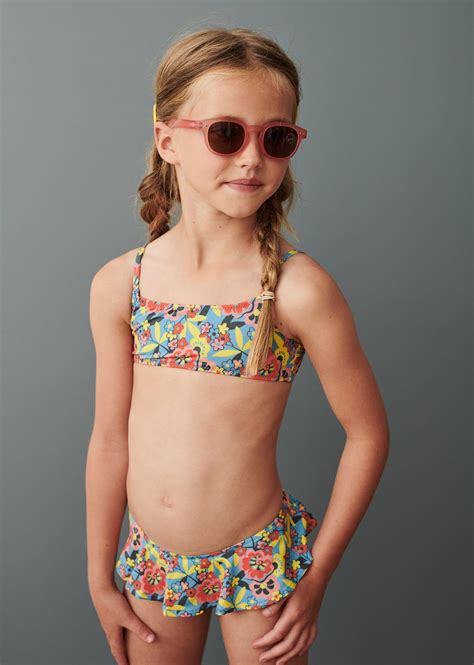 Our Sago Bikini In The Vibrant Vintage Floral Print Featuring A Ruffle