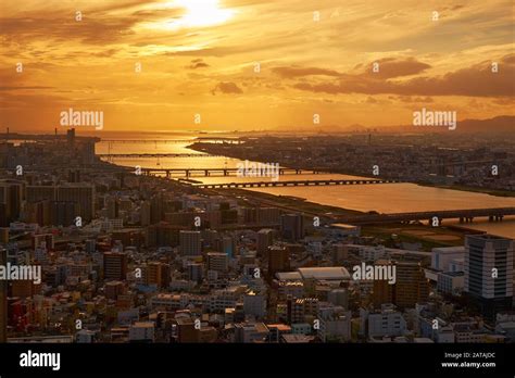 The birds eye view of Yodo River in the golden light of sunset. Osaka. Japan Stock Photo - Alamy