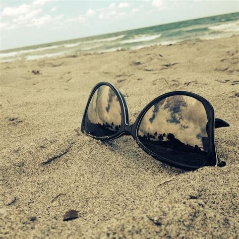 Premium Photo Sunglasses On Beach