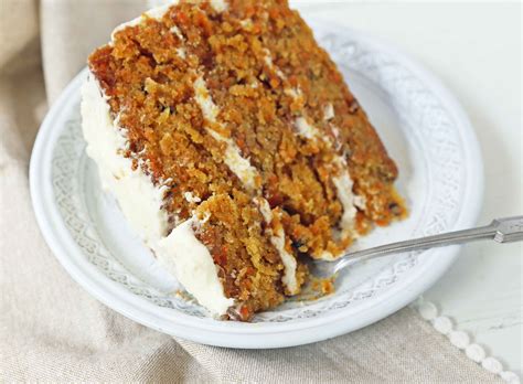 The Best Carrot Cake Recipe. A moist, tender carrot cake covered in a ...