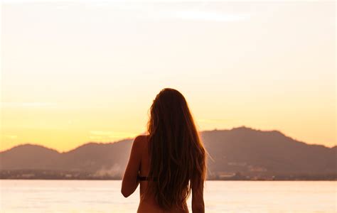 Free Photo Woman Standing In Front Of The Sea Beach Relaxation