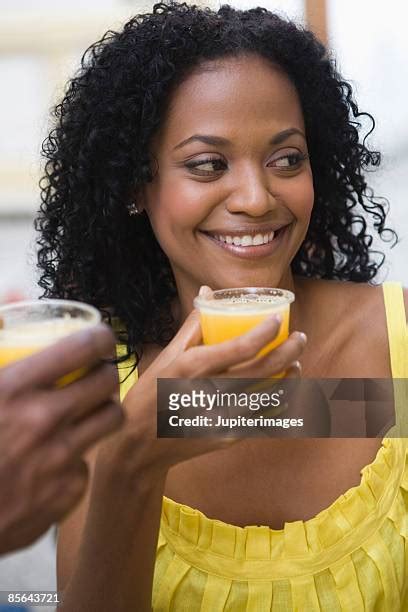 841 Black Woman Orange Juice Stock Photos High Res Pictures And