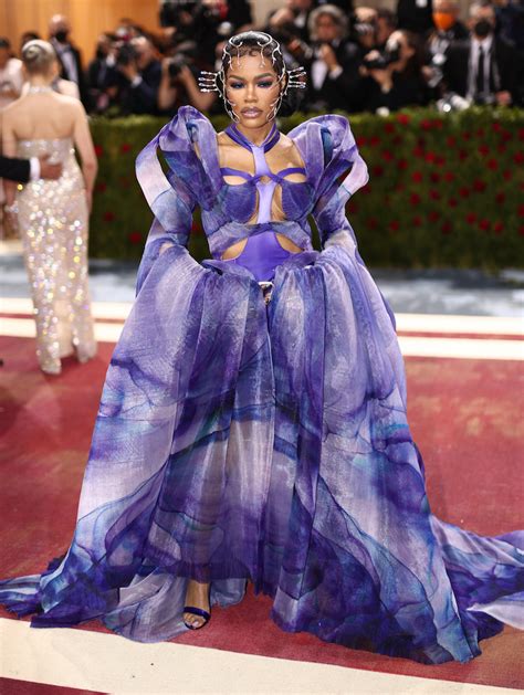 Teyana Taylor Brings Dramatic Glam In Edgy Purple Dress At Met Gala Footwear News