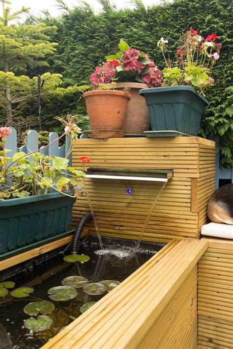 Raised Timber Pond With Waterfall And Bench Garden Pond Design Pond