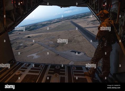 A U S Air Force Loadmaster Monitors Two D Special Operations Wing