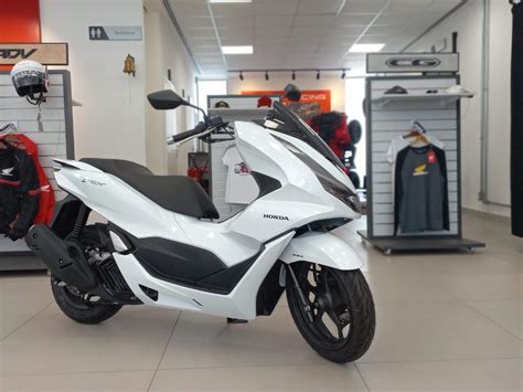 Honda PCX 2024 mecânica desempenho e quantos Km faz por litro