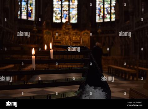 Candlelight and stained glass in Lichfield Cathedral Stock Photo - Alamy