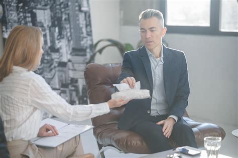Premium Photo Blonde Psychologist Talking To A Male Patient At Her Office