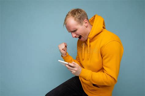 Side Profile Photo Shot Of Handsome Thoughtful Blonde Man Stock Image