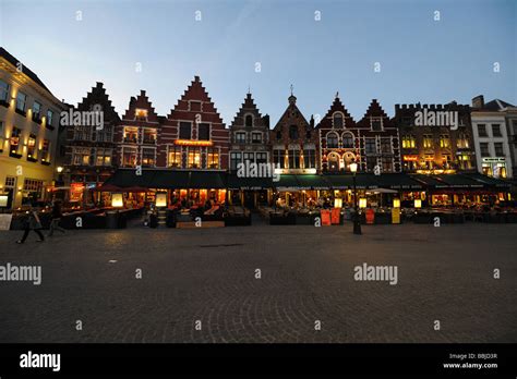 Market square at night in Bruges Belgium Europe Stock Photo - Alamy