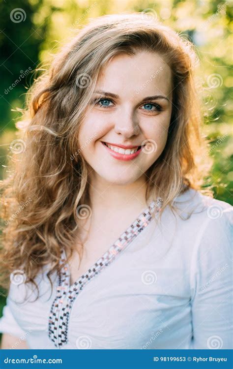 Portrait Of Happy Young Beautiful Pretty Plus Size Caucasian Girl Stock