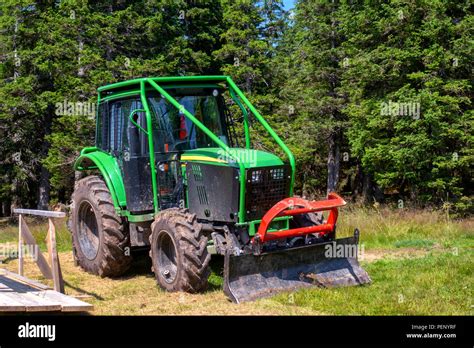 Green Forestry tractor with Roll cage and plough, timber industry ...