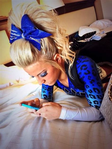 Pin By Kristin Mcdaniel On Cheerleading Cheer Hair Cheerleading Hairstyles Cheer Athletics