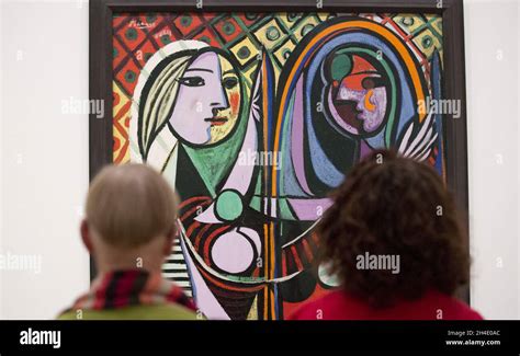 Two Women Looking At Pablo Picasso S Girl Before A Mirror 1932 During A Preview Of The