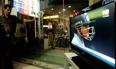 A Security Guard Watches Sachin Tendulkar Bat