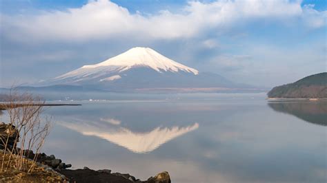 Fujisan With Beautiful Water Reflection At Lake Yamanaka Stock Photo