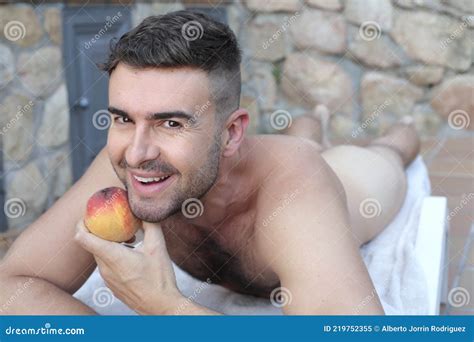 Gorgeous Naked Man Holding A Peach Stock Image Image Of Nude Lying