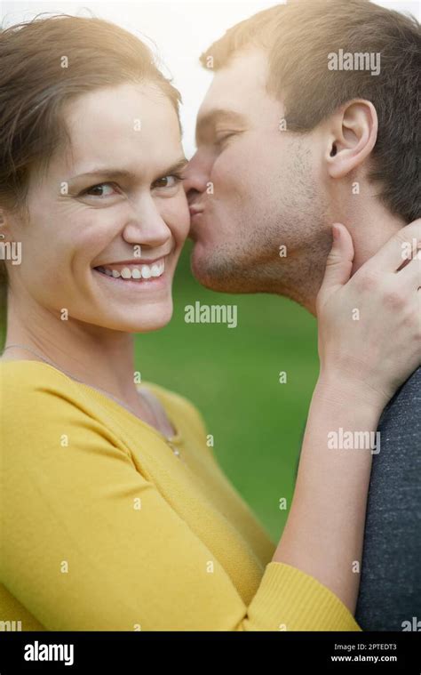 He Just Couldnt Resist Another Kiss A Happy Woman Receiving A Kiss