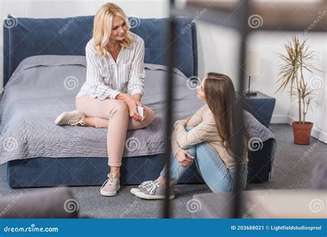 Focus Of Mature Woman Sitting On Stock Image Image Of Speaking Parenting