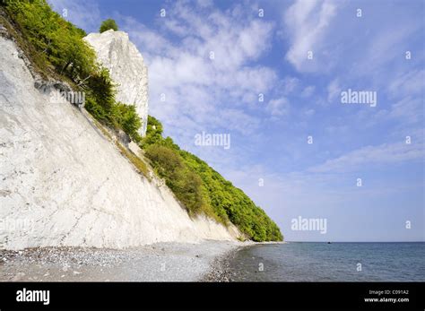 Gravel Beach And The Famous Koenigsstuhl Chalk Cliff On The Baltic Sea