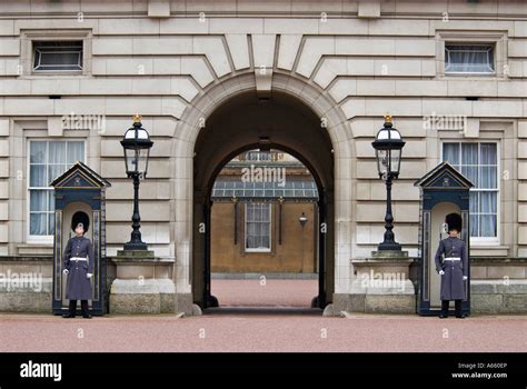 Sentries Of The Queens Guard In Winter Uniform Stationed In The