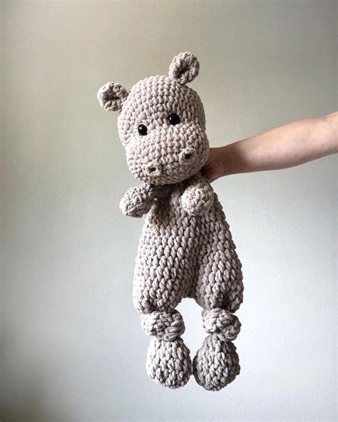 This Super Soft Plush And Thick Hand Crocheted Hippo Snuggler Will