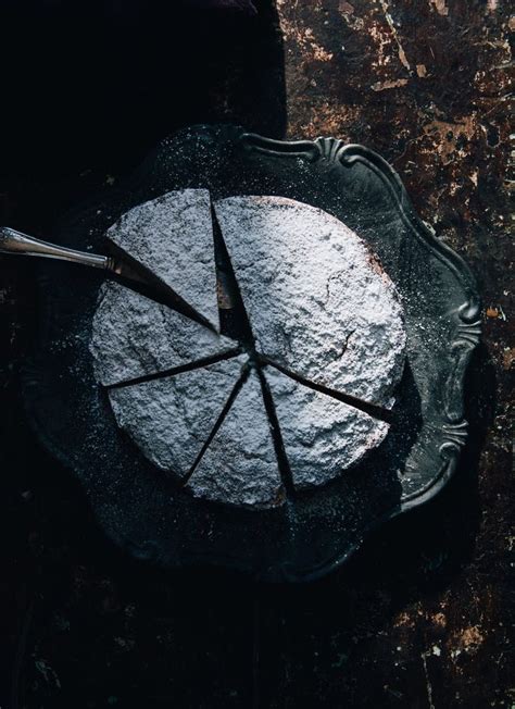 A Cake On A Plate With Two Forks