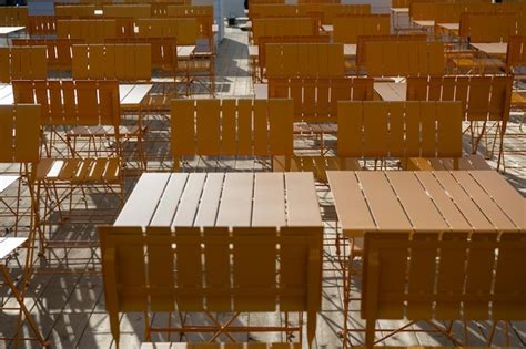 Premium Photo Low Angle View Of Tables And Chairs