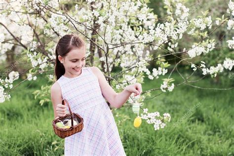 Girl Holding Basket Of Decorated Eggs Stock Photo By ©kruchenkova 39459797