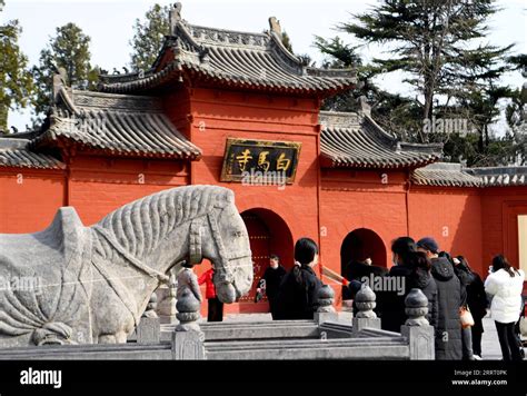 230620 -- ZHENGZHOU, June 20, 2023 -- Tourists visit the Baima Temple ...