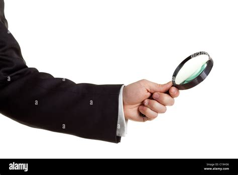 Hand Holding A Magnifying Glass Isolated On White Stock Photo Alamy